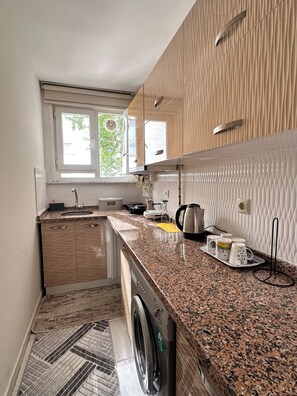 Family House, Courtyard View | Private kitchen | Mini-fridge, microwave, cookware/dishes/utensils