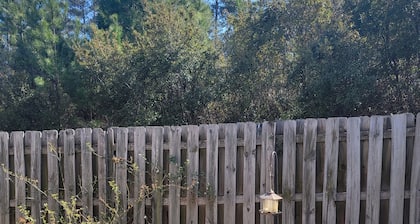 Unplug and Enjoy a cozy home with a backyard patio, grill, and free Wi-Fi.