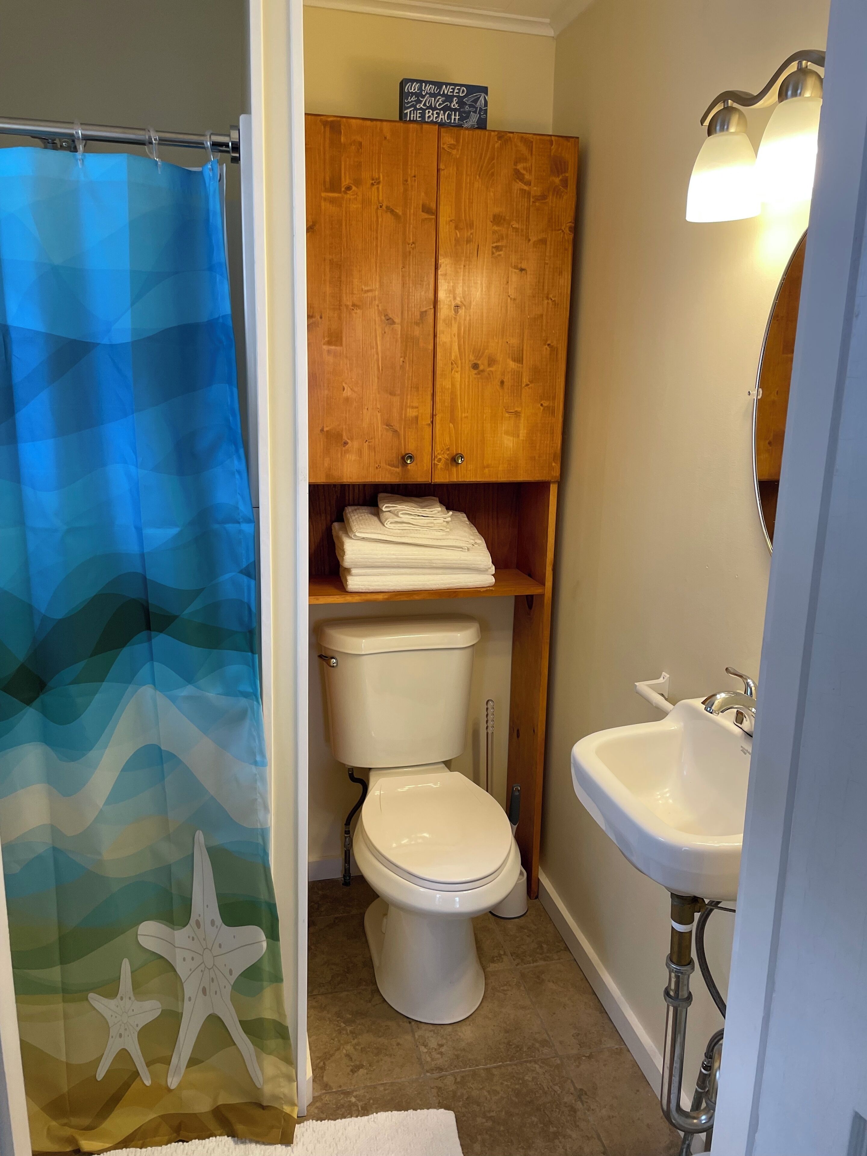 Shower, towels, soap, toilet paper