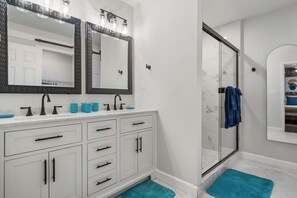 Shower, hair dryer, towels
