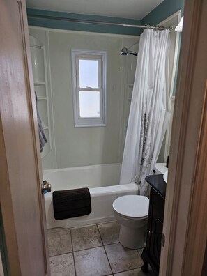 Hair dryer, towels, soap, shampoo