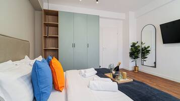 2 habitaciones, cortinas blackout y tabla de planchar con plancha