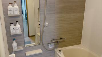 Hair dryer, towels, soap, shampoo