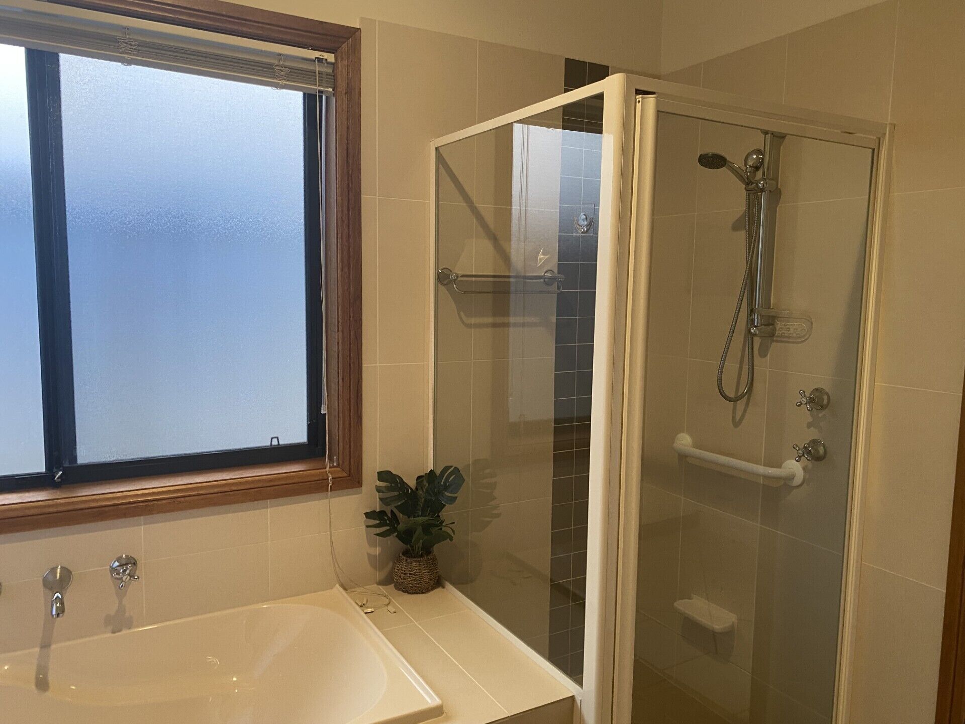 Shower, hair dryer, towels, toilet paper