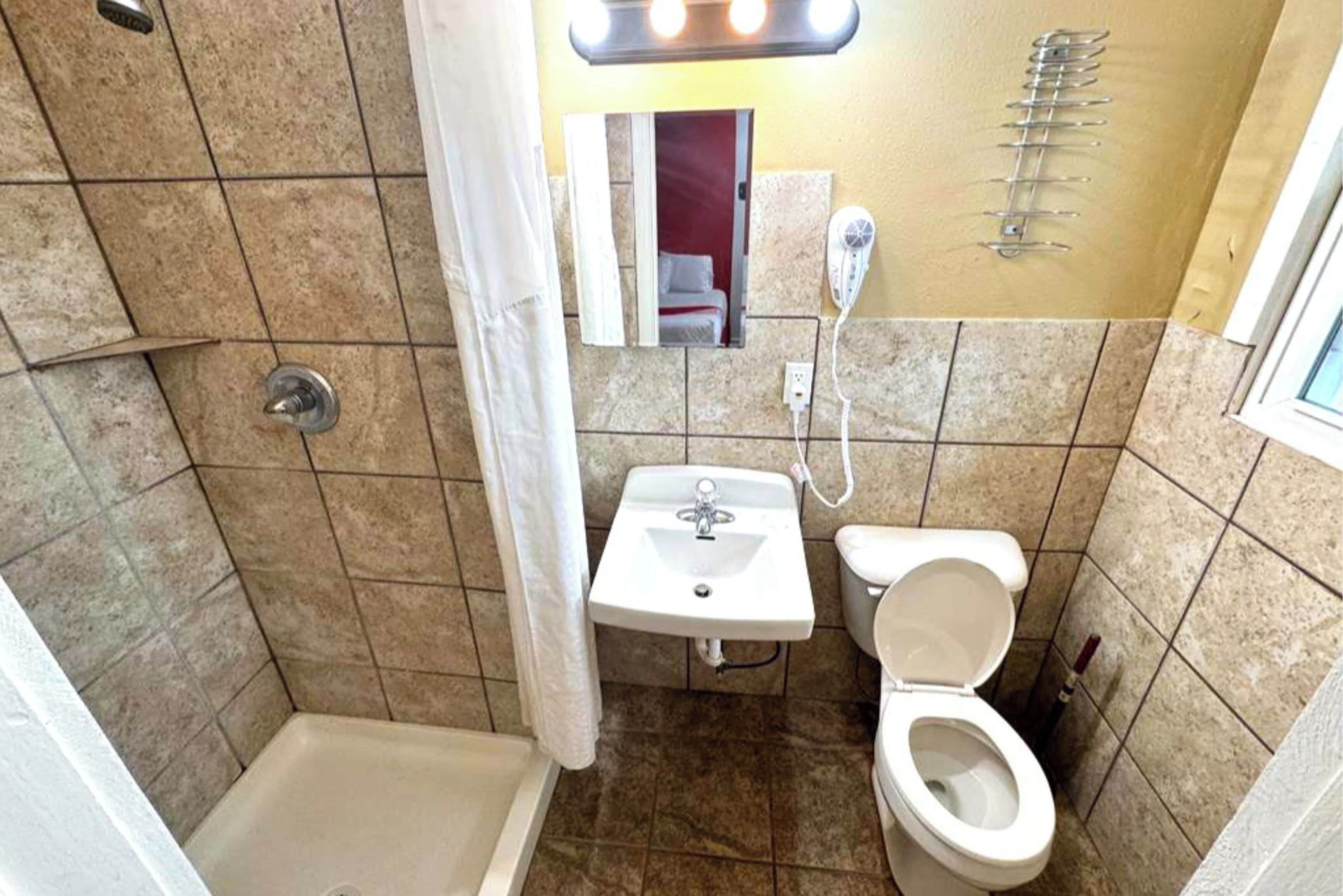 Room, 1 Queen Bed, Smoking | Bathroom | Free toiletries, hair dryer, towels