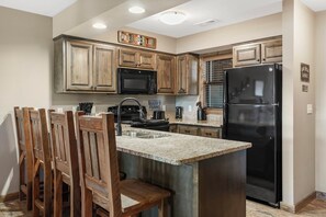 Fridge, microwave, oven, stovetop - Family-Friendly 2BR • Patios, Fireplaces, Pools & Lake Resort Fun (Branson)