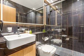 Shower, hair dryer, towels, soap