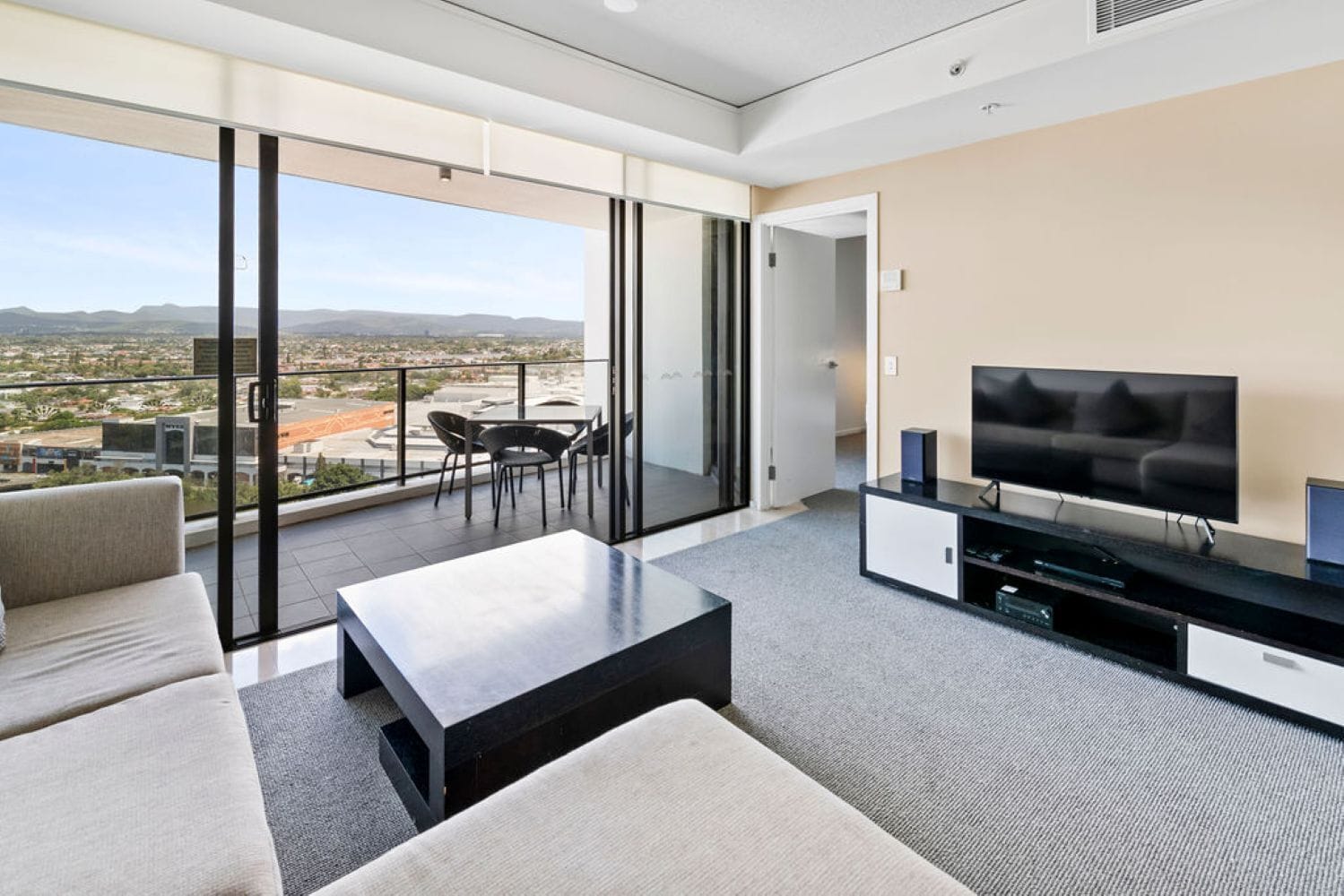 Apartment, 1 Bedroom, City View | Living area | 50-inch Smart TV with cable channels