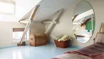 1 bedroom, desk, iron/ironing board, travel crib