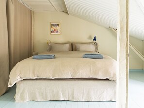 1 bedroom, desk, iron/ironing board, travel crib