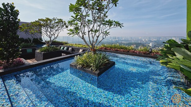A rooftop pool with a cityscape view, surrounded by greenery and modern architecture. - The Riv Riveria City KL Sentral (Kuala Lumpur)