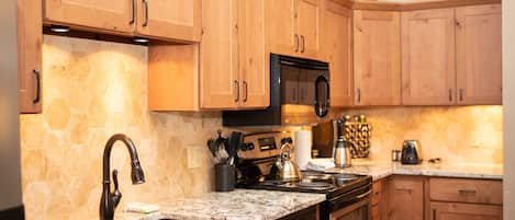 Condo, 2 Bedrooms | Private kitchen | Fridge, oven, coffee/tea maker, toaster