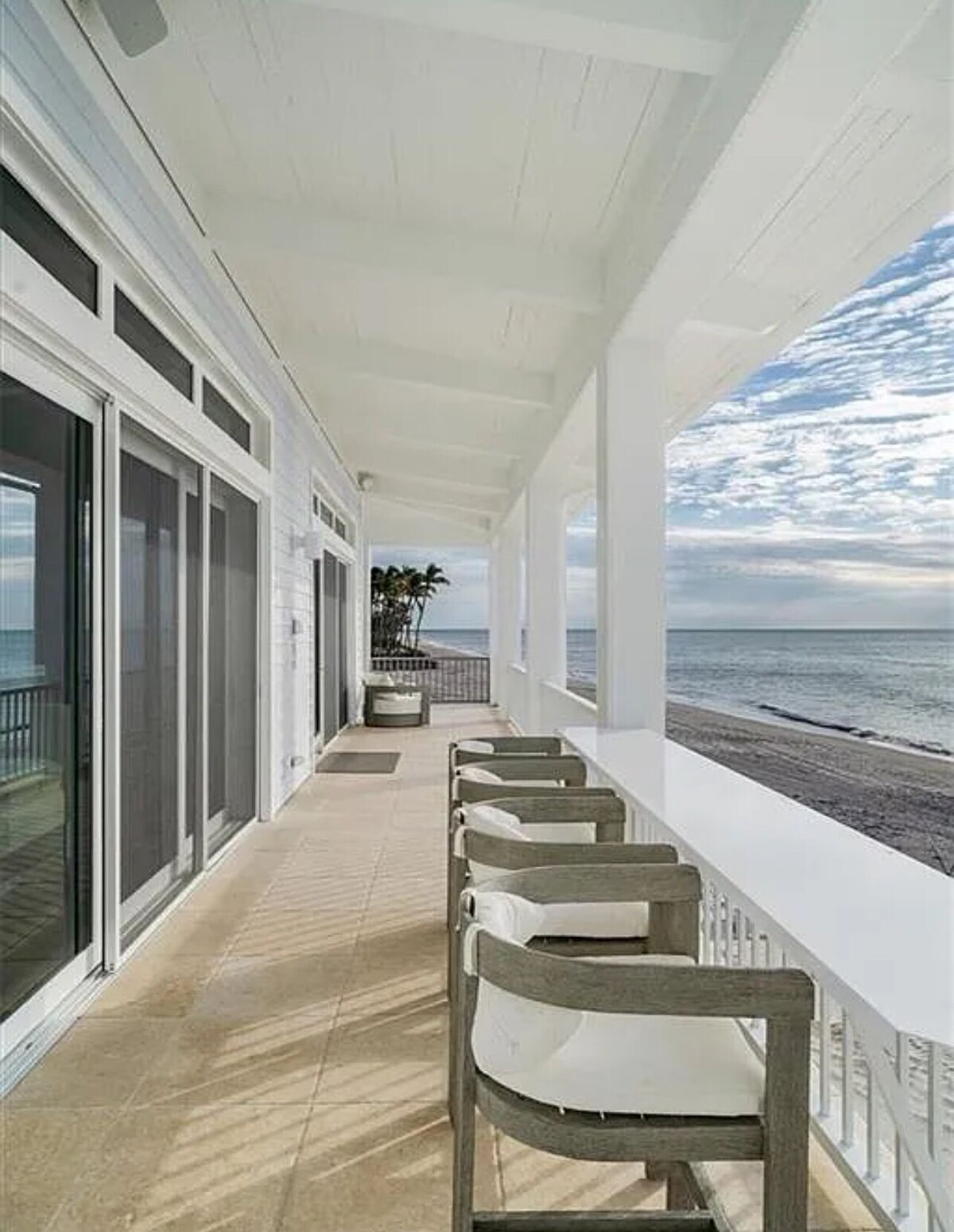 Photo 9 of Private Beach Oceanfront Mansion in Luxurious Naples Spacious 5-bedroom Palms