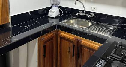 Cozy suite with kitchen and private bathroom. 5 minutes from downtown