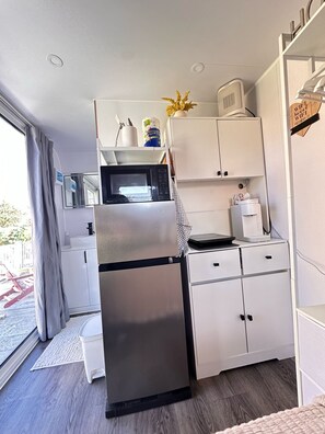 Microwave, stovetop, coffee/tea maker, toaster