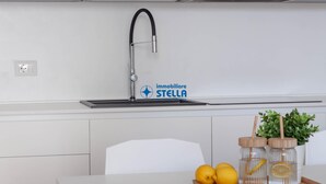 Microwave, oven, dishwasher, cookware/dishes/utensils - *Wave Island Resort F3* [ pool & free park ] (Lido di Jesolo)