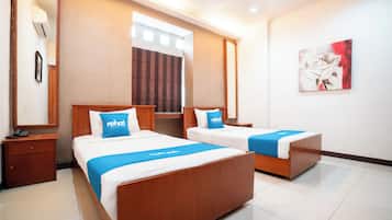 Deluxe-værelse med 2 enkeltsenge | Skrivebord, arbejdsområde til bærbare computere, gratis Wi-Fi, sengetøj