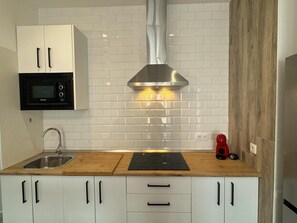 Fridge, microwave, coffee/tea maker, toaster