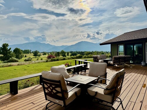 Elevated Elegance with Golf Course Access & Panoramic Valley Views