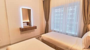 2 chambres, fer et planche à repasser, Wi-Fi, draps fournis