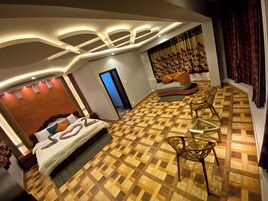 Hill View Suite Room | Iron/ironing board, free WiFi, bed sheets