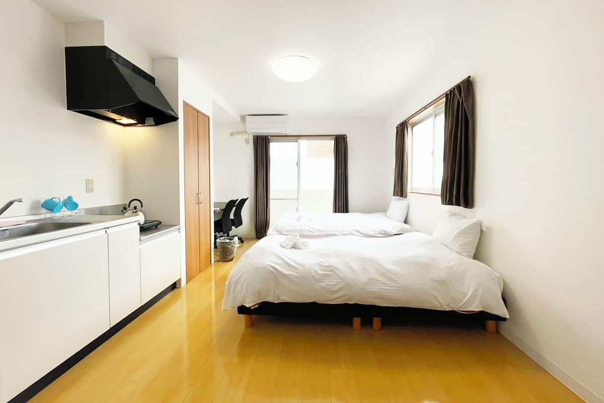 Chambre Double, coin cuisine, vue ville | Wi-Fi gratuit
