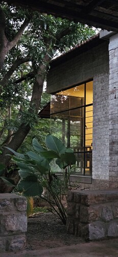 Chic Rustic farmhouse amidst a mango orchard beneath the  Western Ghats of India