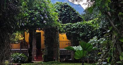 Chic Rustic farmhouse amidst a mango orchard beneath the Western Ghats of India