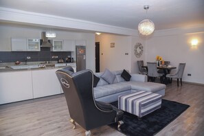 Executive Apartment, 1 Bedroom, Non Smoking | Living area | 42-inch Smart TV with satellite channels - Lavington Residences By Trianum (Nairobi)