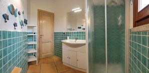 Regadera, secadora de cabello, bidet 