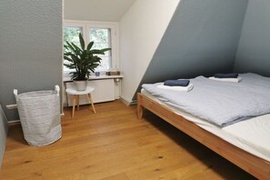 2 dormitorios, tabla de planchar con plancha, wifi gratis y ropa de cama