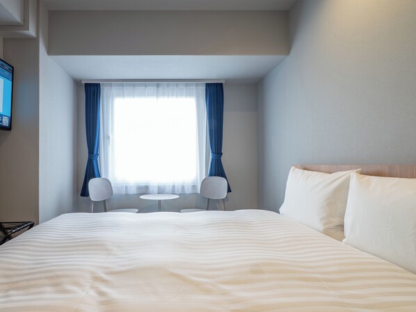 Desk, free WiFi, bed sheets