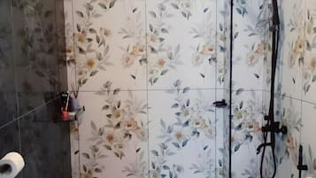 Shower, bidet, towels, soap