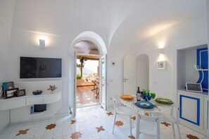 House, Private Pool, Sea View | Living area | 32-inch flat-screen TV with digital channels - YourHome - La Casupola (Positano)