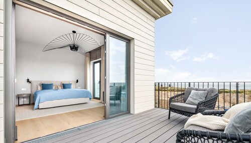 Penthouse Suite mit Meerblick, Balkon und Kamin