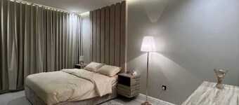 LP58.7 - Warm 1BR Apartment in Al Malqa