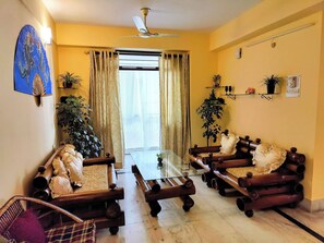 Living room - Cozy Guwahati Apartment With City & Mountain Views (Guwahati)
