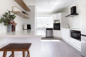 Fridge, microwave, oven, stovetop - Charming 3-Bedroom Home with Sunroom & Parking (Launceston City)