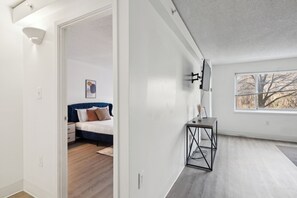 1 bedroom, desk, iron/ironing board, travel cot