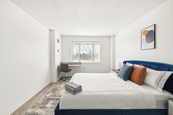 2 bedrooms, desk, iron/ironing board, travel crib