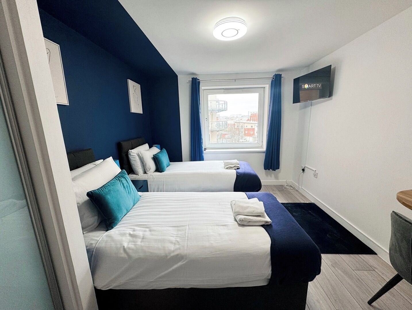 2 bedrooms, desk, iron/ironing board, travel cot