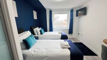 2 bedrooms, desk, iron/ironing board, travel cot