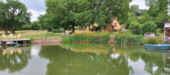 Self-contained cottage in the countryside, sleeps 4, pond, games, bikes, wifi.