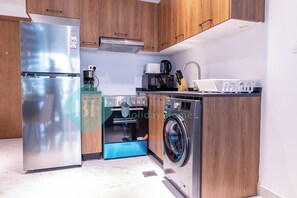 Electric kettle, toaster - Bloomfields Elegant 2BR In Oasis Masdar (Abu Dhabi)