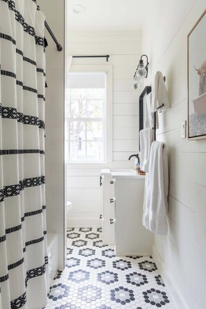 Shower, hair dryer, shampoo