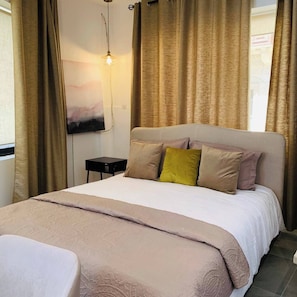 1 habitación, tabla de planchar con plancha, wifi gratis y ropa de cama