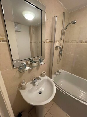 Hair dryer, towels, soap, toilet paper