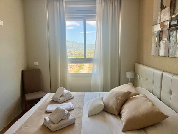 2 slaapkamers, een strijkplank/strijkijzer