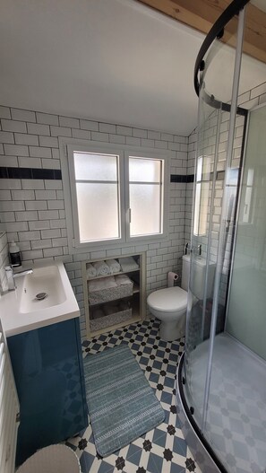 Hair dryer, towels, soap, toilet paper