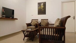 Chambre Classique, balcon, vue ville | Coin séjour